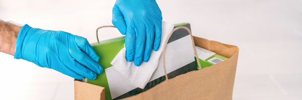 Cleaning items from a shopping bag.